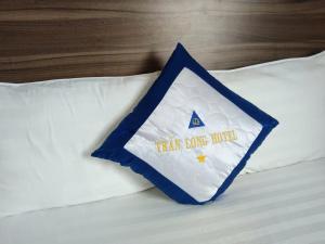 Postel nebo postele na pokoji v ubytování Hotel Trần Long