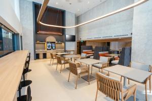 Posezení v ubytování Novotel Living Singapore Orchard