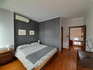Posteľ alebo postele v izbe v ubytovaní Maison Giolitti