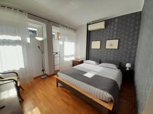 Posteľ alebo postele v izbe v ubytovaní Maison Giolitti