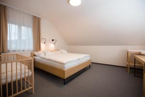 Postel nebo postele na pokoji v ubytování Vila Vivenot + 37 fotografií