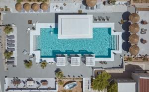 an overhead view of a swimming pool with a resort at Althea Boutique Hotel - Adults Only in Amoopi