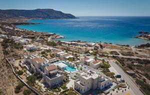 an aerial view of a resort next to the ocean at Althea Boutique Hotel - Adults Only in Amoopi