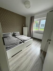 Postel nebo postele na pokoji v ubytování Taunus Paradies