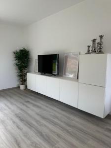 TV a/nebo společenská místnost v ubytování Taunus Paradies