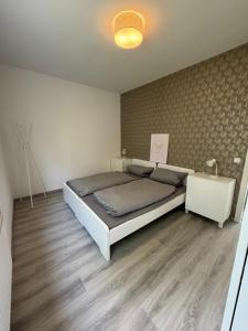 Postel nebo postele na pokoji v ubytování Taunus Paradies