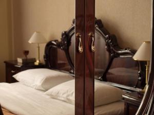 Voodi või voodid majutusasutuse George Hotel toas
