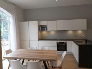 Kuchyň nebo kuchyňský kout v ubytování Coliving-Colocation du Châtelet