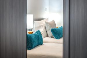 Postel nebo postele na pokoji v ubytování Gavirate Lake apartment