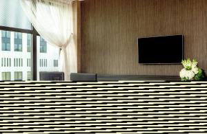 TV a/nebo společenská místnost v ubytování Doubletree By Hilton Youngstown Downtown