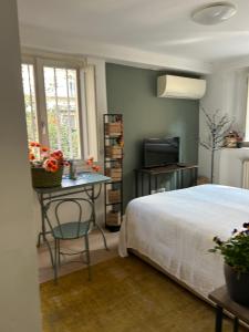 Posteľ alebo postele v izbe v ubytovaní Loft Crimea con patio