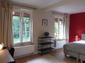 Postel nebo postele na pokoji v ubytování Coliving-Colocation du Châtelet