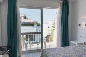 A balcony or terrace at Hotel Amic Can Pastilla