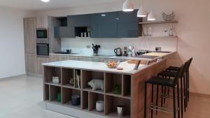O bucătărie sau chicinetă la CSB Apartment