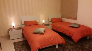 Llit o llits en una habitació de CSB Apartment
