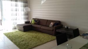 O zonă de relaxare la CSB Apartment