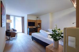 Postel nebo postele na pokoji v ubytování m3Hotel
