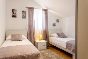 Ένα ή περισσότερα κρεβάτια σε δωμάτιο στο House Jurica +30 φωτογραφίες
