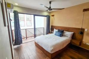 Ένα ή περισσότερα κρεβάτια σε δωμάτιο στο The Palm Penthouse +48 φωτογραφίες