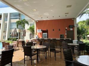 Εστιατόριο ή άλλο μέρος για φαγητό στο Guarajuba Apart Hotel Porto Smeralda