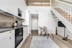 Η κουζίνα ή μικρή κουζίνα στο Kotimaailma - Studio with loft and patio for 2 pax +1 φωτογραφίες