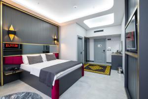 Postel nebo postele na pokoji v ubytování 216 Prestige Hotel