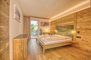 Posteľ alebo postele v izbe v ubytovaní Alpin & Seeresort Top 14 - by Alpen Apartments