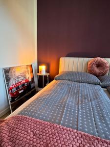 Uma cama ou camas num quarto em Carl von Rosé