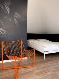 Uma cama ou camas num quarto em Carl von Rosé