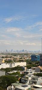 Nespecifikovaný výhled na destinaci Jakarta nebo výhled na město při pohledu z apartmánu