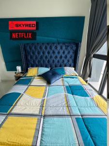 Postelja oz. postelje v sobi nastanitve Netflix SkyRed B1036 Core Soho near KLIA