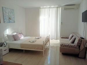 Χώρος καθιστικού στο Cozy Rooms At Old City Gate