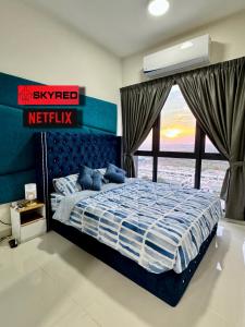 Postelja oz. postelje v sobi nastanitve Netflix SkyRed B1036 Core Soho near KLIA
