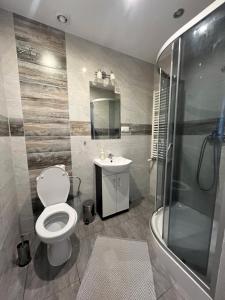 Kúpeľňa v ubytovaní Hostel & Restauracja Santorini