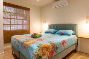 Postel nebo postele na pokoji v ubytování J&L Resort + 37 fotografií