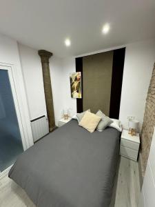 Ένα ή περισσότερα κρεβάτια σε δωμάτιο στο Lovely San Diego center Apartament BI Parking opcional