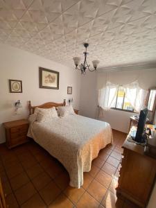 Ένα ή περισσότερα κρεβάτια σε δωμάτιο στο Casa Susana