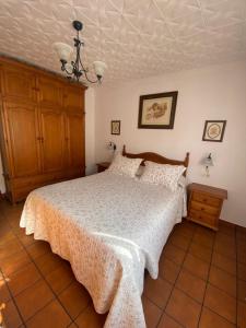 Ένα ή περισσότερα κρεβάτια σε δωμάτιο στο Casa Susana +2 φωτογραφίες