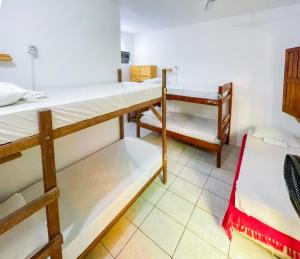 Postel nebo postele na pokoji v ubytování Buddy's Hostel Itacaré