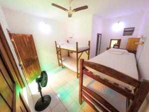 Postel nebo postele na pokoji v ubytování Buddy's Hostel Itacaré
