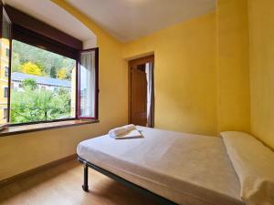 Postel nebo postele na pokoji v ubytování Apartamentos Canfranc 3000
