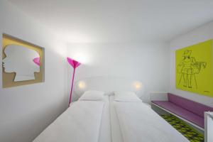 Кровать или кровати в номере Prize by Radisson, Bremen City