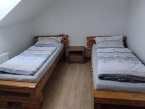 Posteľ alebo postele v izbe v ubytovaní Ubytování v Žimrovicích