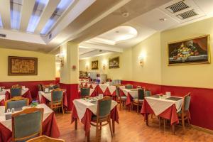 En restaurang eller annat matställe på Hotel Impero