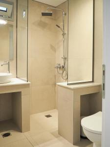 Koupelna v ubytování Trinity Urban Residences Plumeria