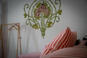 Postel nebo postele na pokoji v ubytování CASABONA1910 bed&breakfast