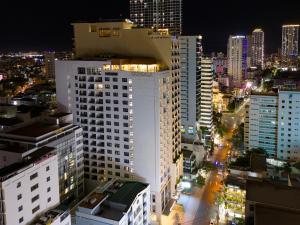 a view of a city at night with buildings at Gonsala Hotel Nha Trang in Nha Trang +126 photos