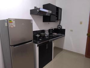 Kuchyň nebo kuchyňský kout v ubytování Minidepartamento ADRIANO