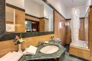 Koupelna v ubytování Hotel Impero