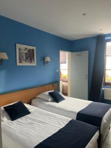 Postel nebo postele na pokoji v ubytování Hotel Restaurant 3 Châteaux